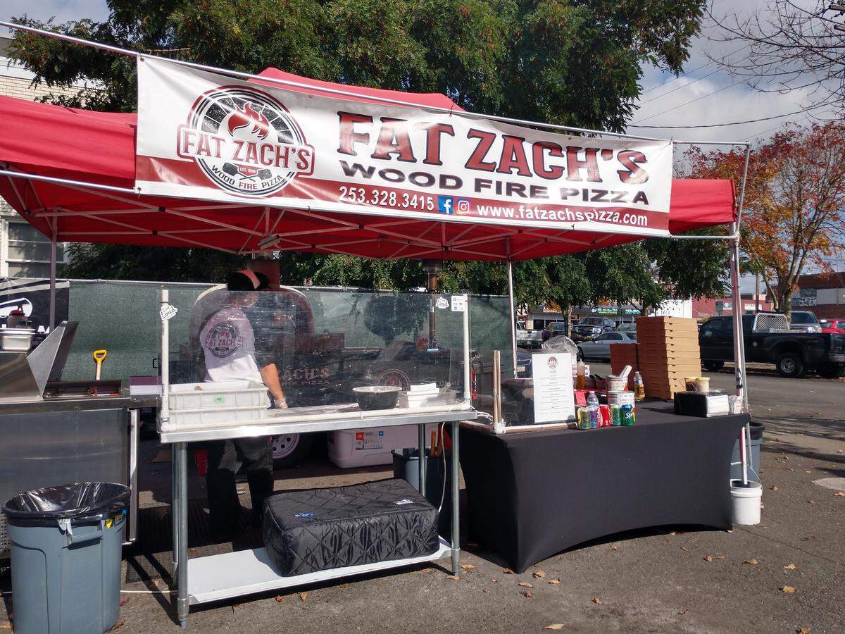 Find Fat Zach’s Wood Fire Pizza as a mobile restaurant in downtown Puyallup.