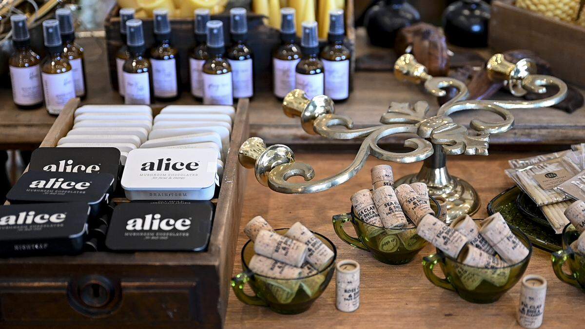 Proprietor Starr Hall personally selects products she believes in including these mushroom chocolate to promote healthy sleep, at Arch & Starr, Wednesday, July 12, 2023, in Gig Harbor, Wash.