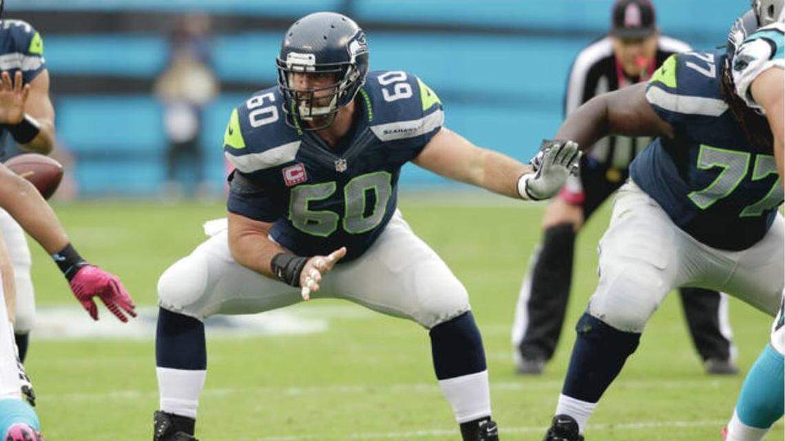 Max Unger (60) was a popular team captain and centerpiece to a plowing offensive line for Russell Wilson, Marshawn Lynch and the Seahawks. Then they traded him in 2015, to get tight end Jimmy Graham. Seattle’s offensive line hasn’t been the same since.