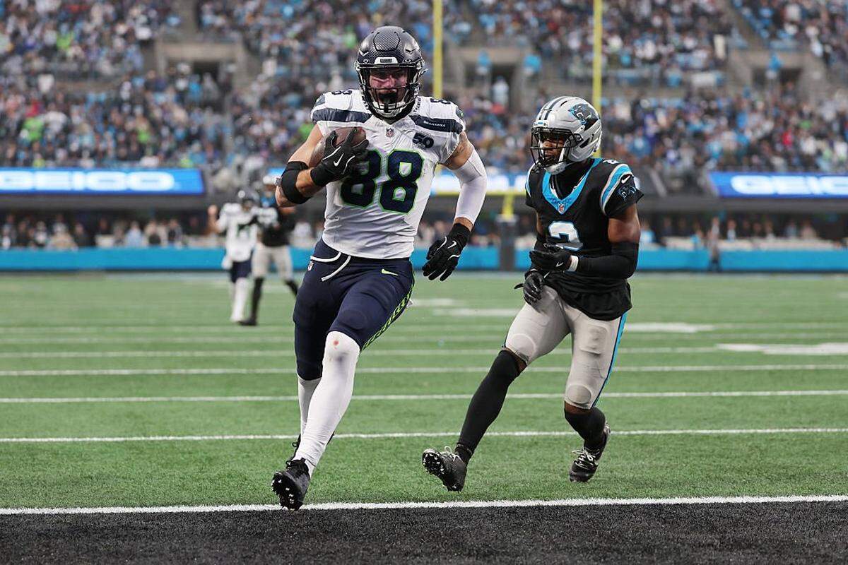 CHARLOTTE, NORTH CAROLINA - DECEMBER 28: AJ Barner #88 of the Seattle Seahawks scores a touchdown against the Carolina Panthers during the third quarter at Bank of America Stadium on December 28, 2025 in Charlotte, North Carolina. (Photo by David Jensen/Getty Images)