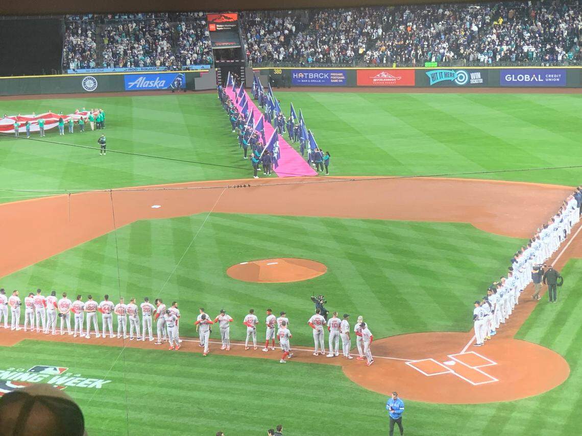 The view of the Mariners and Boston Red Sox after Ben Gibbard, from the Bellingham-formed band Death Cab for Cutie, sang the national anthem before the opening game of the Major League Baseball season in Seattle March 28, 2024.