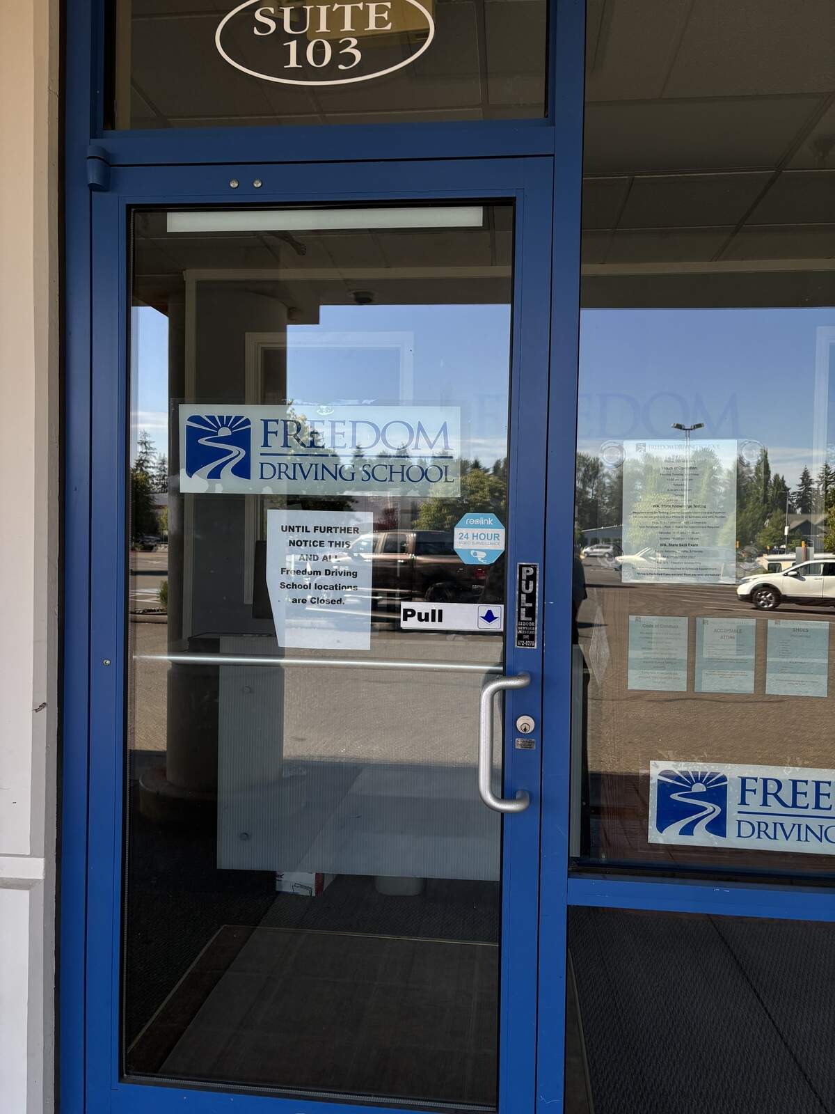Signage on the door of the South Hill Freedom Driving School location says all their locations have closed.