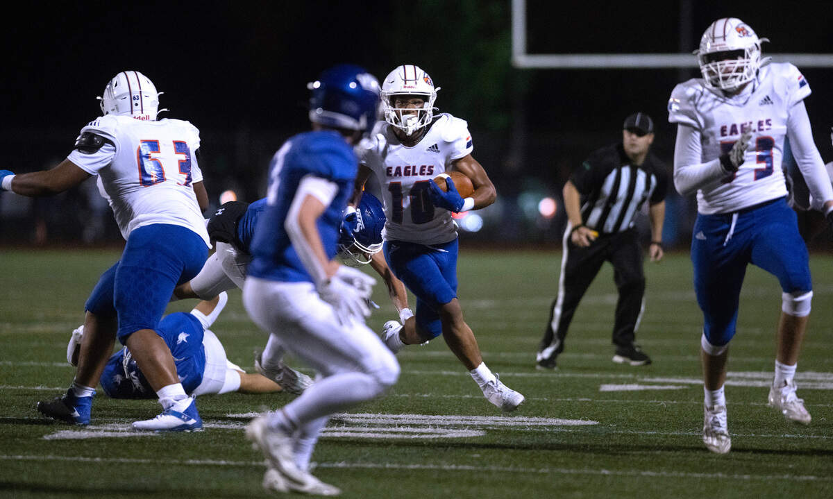 Graham Kapowsin wide receiver Jabez Woods runs the ball during Friday night’s 4A SPSL football game against the Graham Kapowsin Eagles at Viking Stadium in University Place, Washington, on Oct. 6, 2023. Graham Kapowsin won the game, 42-35.
