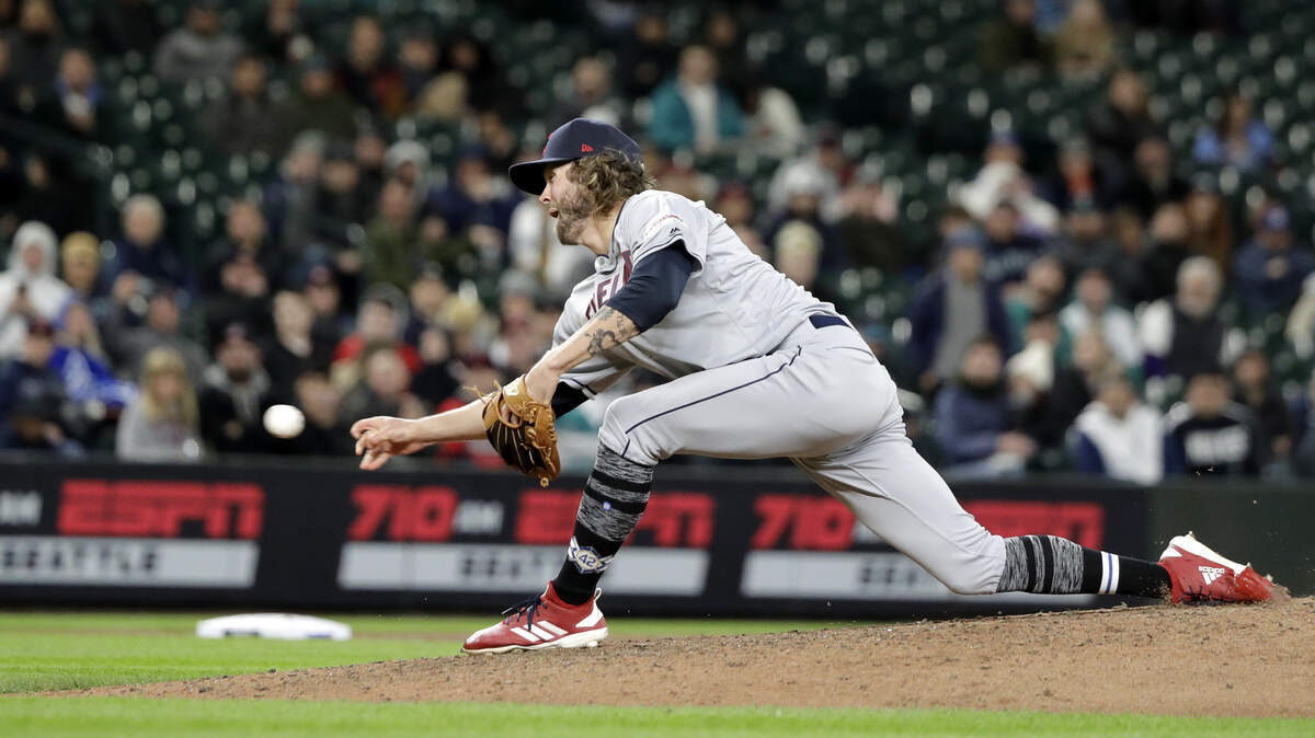 Cleveland Indians pitcher Adam Cimber throws against the Seattle Mariners during the seventh inning of a baseball game against the Seattle Mariners, Monday, April 15, 2019, in Seattle.