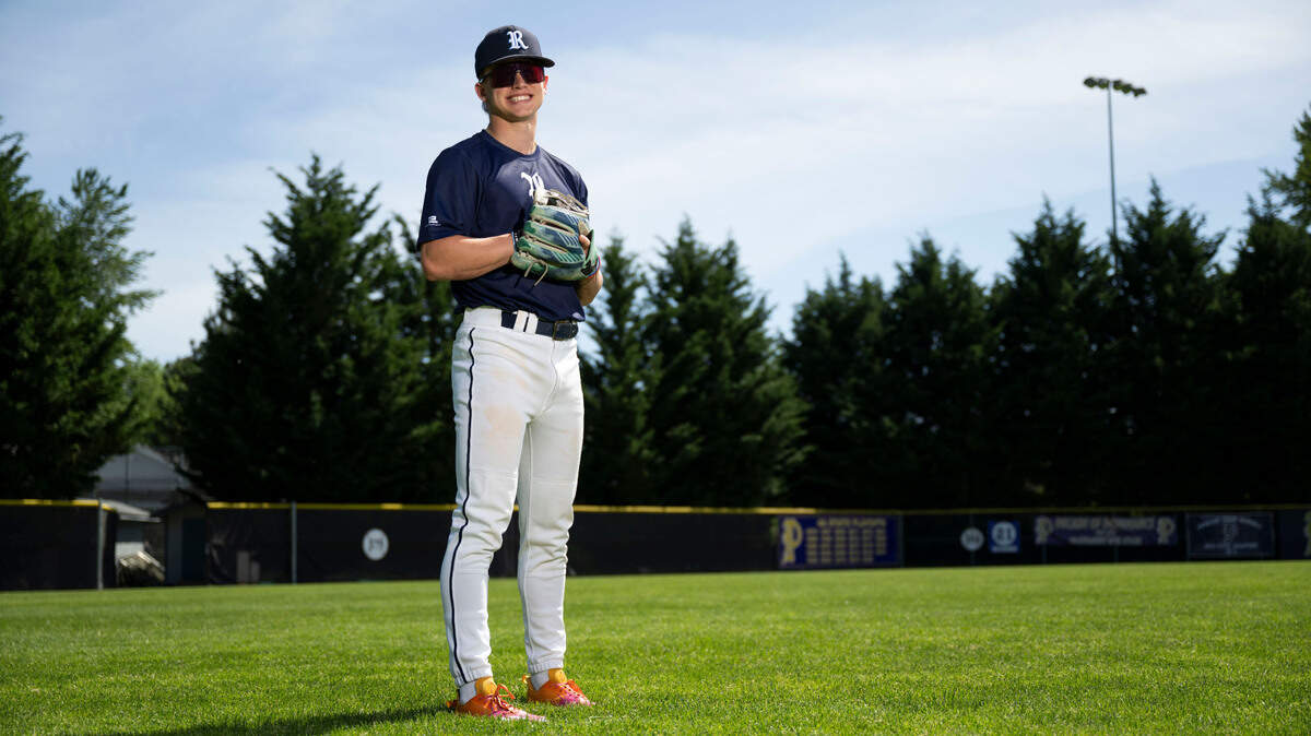 Rogers High School third baseman Ian Draper poses for a portrait at Heritage Recreation Center, on Wednesday, May 15, 2024, in Puyallup, Wash.