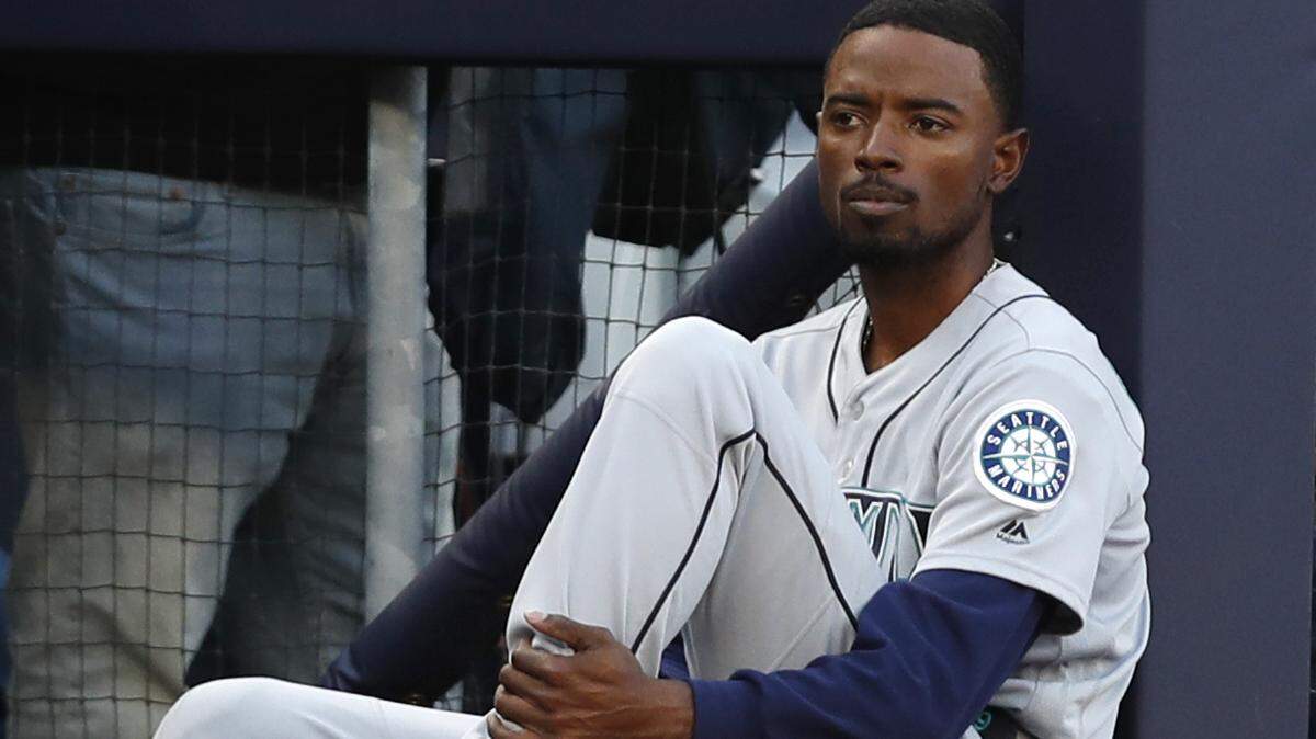Seattle Mariners Dee Gordon watches from the dugout steps during a baseball game against the New York Yankees, Tuesday, May 7, 2019, in New York. (AP Photo/Kathy Willens)