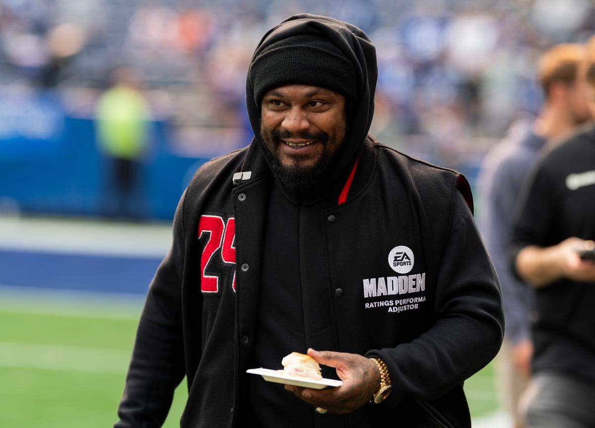 Former Seahawks running back Marshawn Lynch walks out before the game between the Seattle Seahawks and the Denver Broncos at Lumen Field, on Sunday, Sept. 8, 2024, in Seattle, Wash.