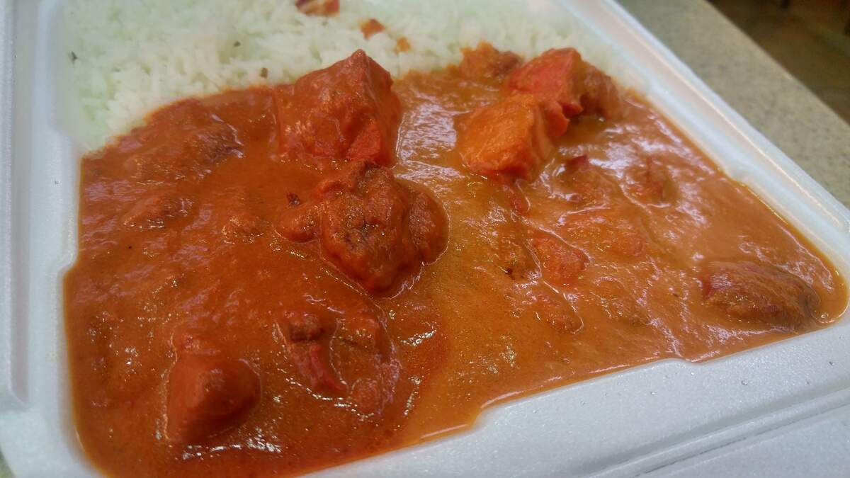 Butter chicken and korma chicken from Lotus Grill Indian Kitchen from South Hill Mall.