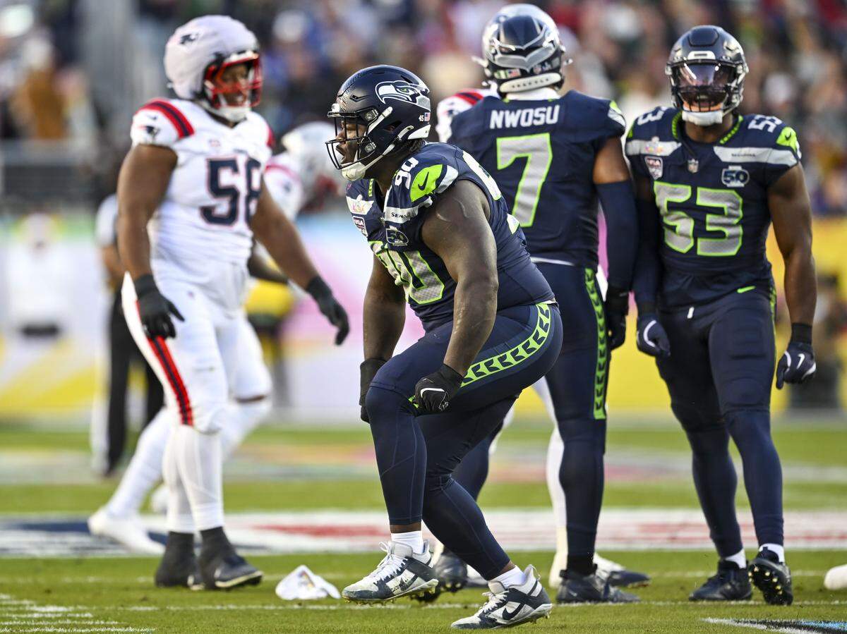 Seattle Seahawks defensive tackle Jarran Reed (90) reacts after a third-down stop during the second quarter of Super Bowl LX against the New England Patriots at Levi's Stadium on Feb. 8, 2026 in Santa Clara, Calif.