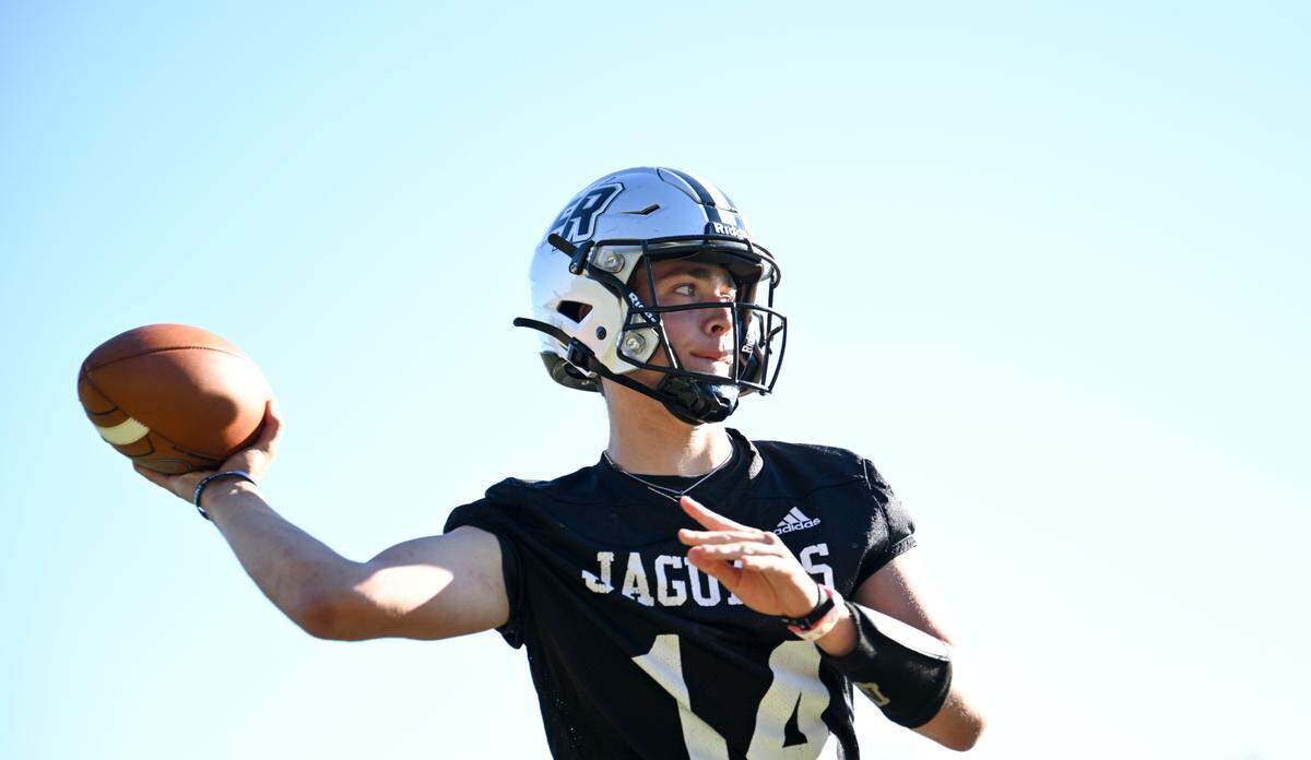 Emerald Ridge Jake Schakel passes the ball during a football practice at Emerald Ridge High School, Wednesday, Aug. 16, 2023, in Puyallup, Wash.