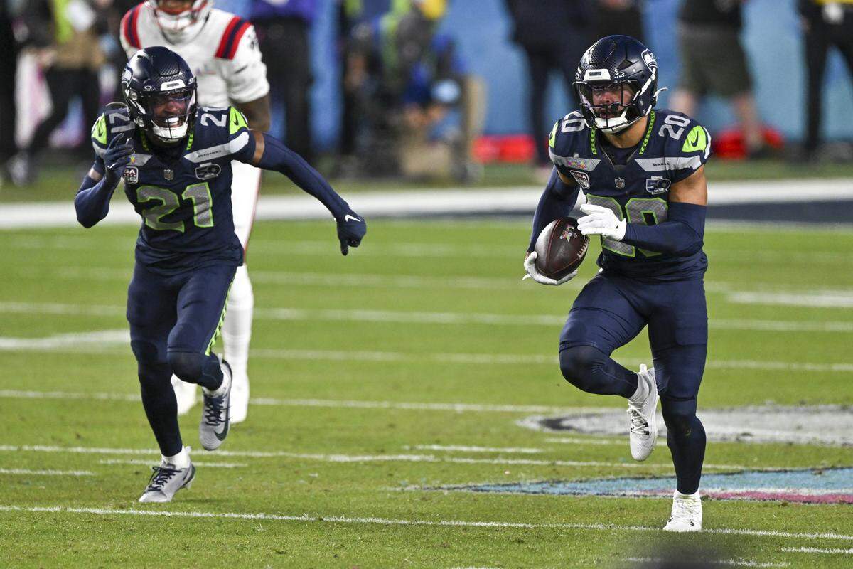 Seattle Seahawks safety Julian Love (20) runs the ball down the field during Super Bowl LX at Levi’s Stadium in Santa Clara on Sunday, Feb. 8, 2026.