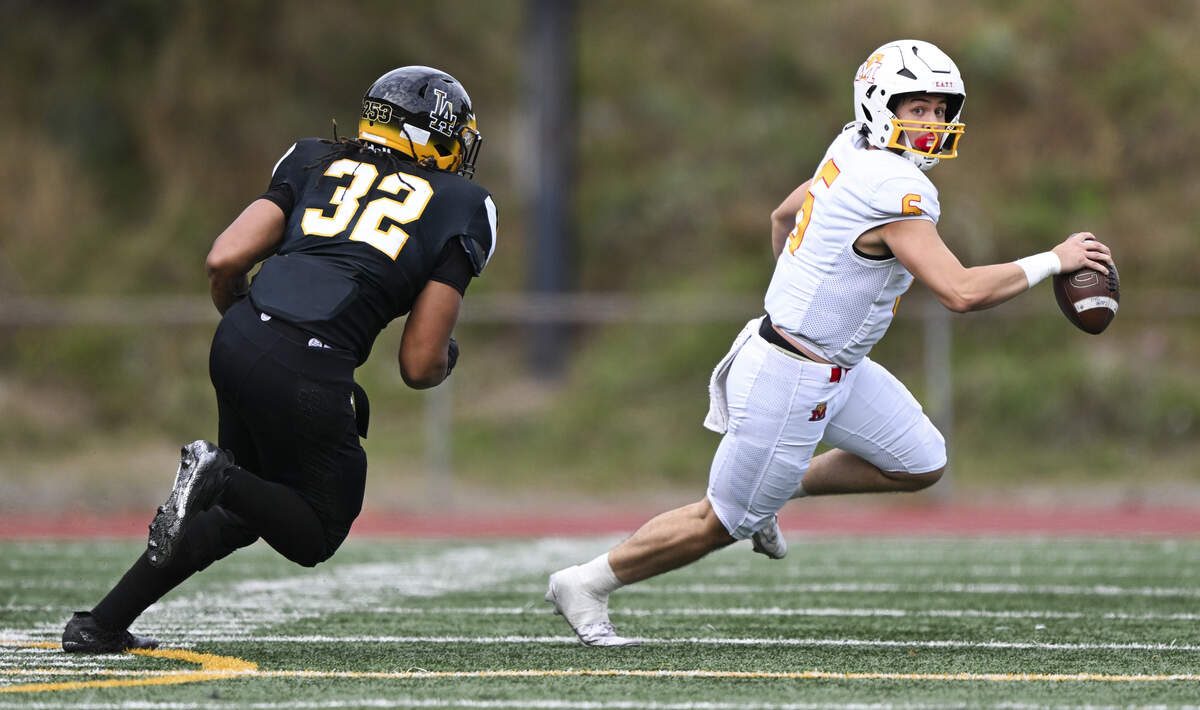 Mount Tahoma quarterback Mikkah Cordero (6) scrambles against the Lincoln Abes during the first half of the game at Lincoln High School, on Saturday, Oct. 4, 2025, in Tacoma, Wash.