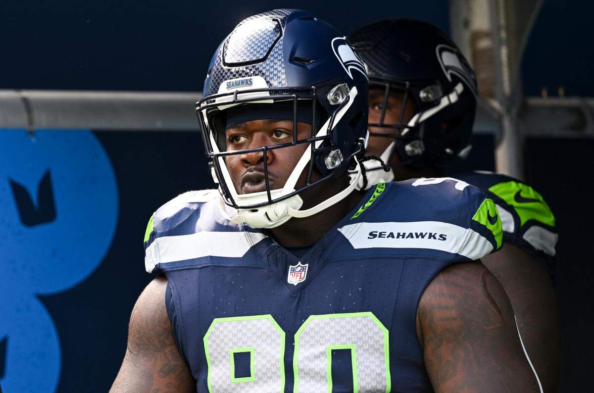 Seattle Seahawks defensive end Jarran Reed (90) waits to run out on the field before the NFL game against the Los Angeles Rams at Lumen Field, Sunday, Sept. 10, 2023, Seattle, Wash.