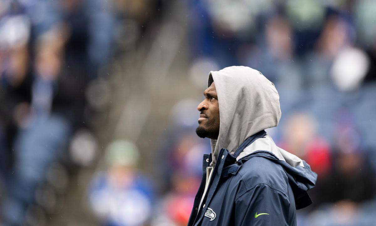 Seattle Seahawks wide receiver DK Metcalf (14) looks on as teammates warm up before the game against the Buffalo Bills at Lumen Field, on Sunday, Oct. 27, 2024 in Seattle, Wash.