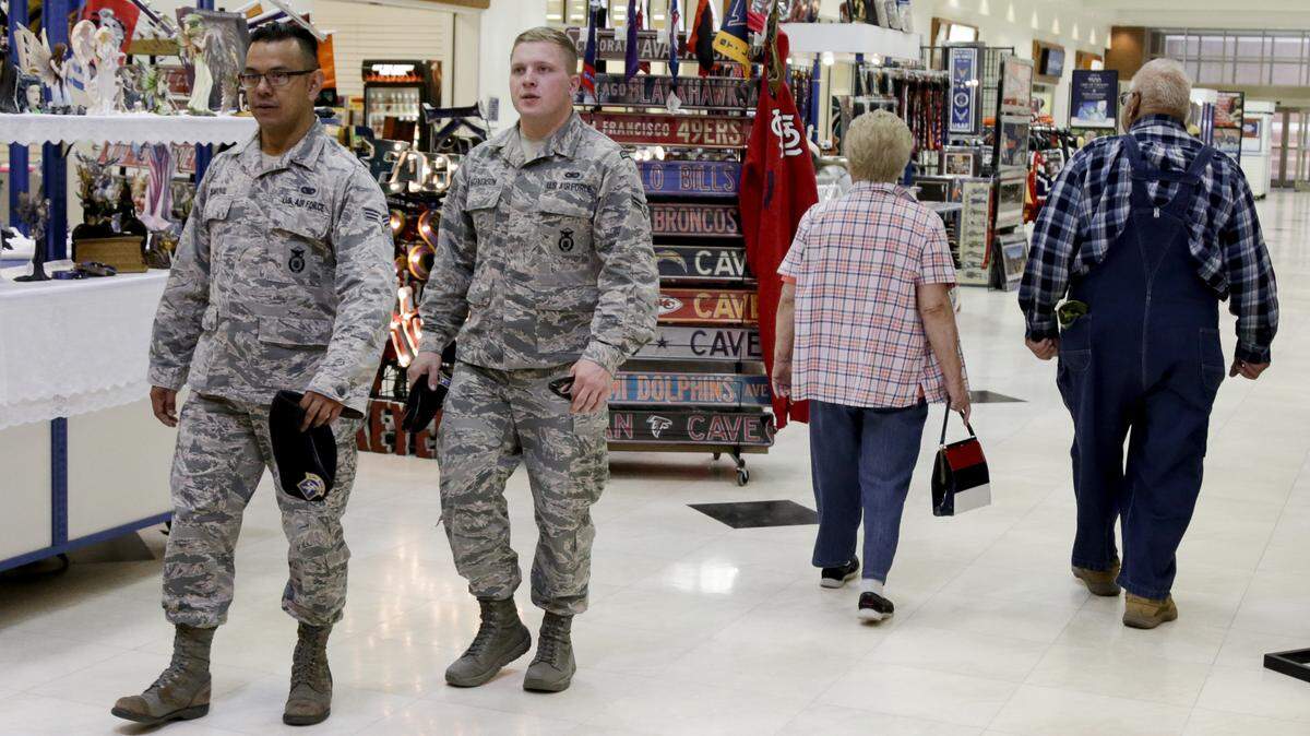 Defense Department officials say they conditionally support opening on-base shopping to disabled veterans, Purple Heart recipients and caregivers of severely injured veterans.