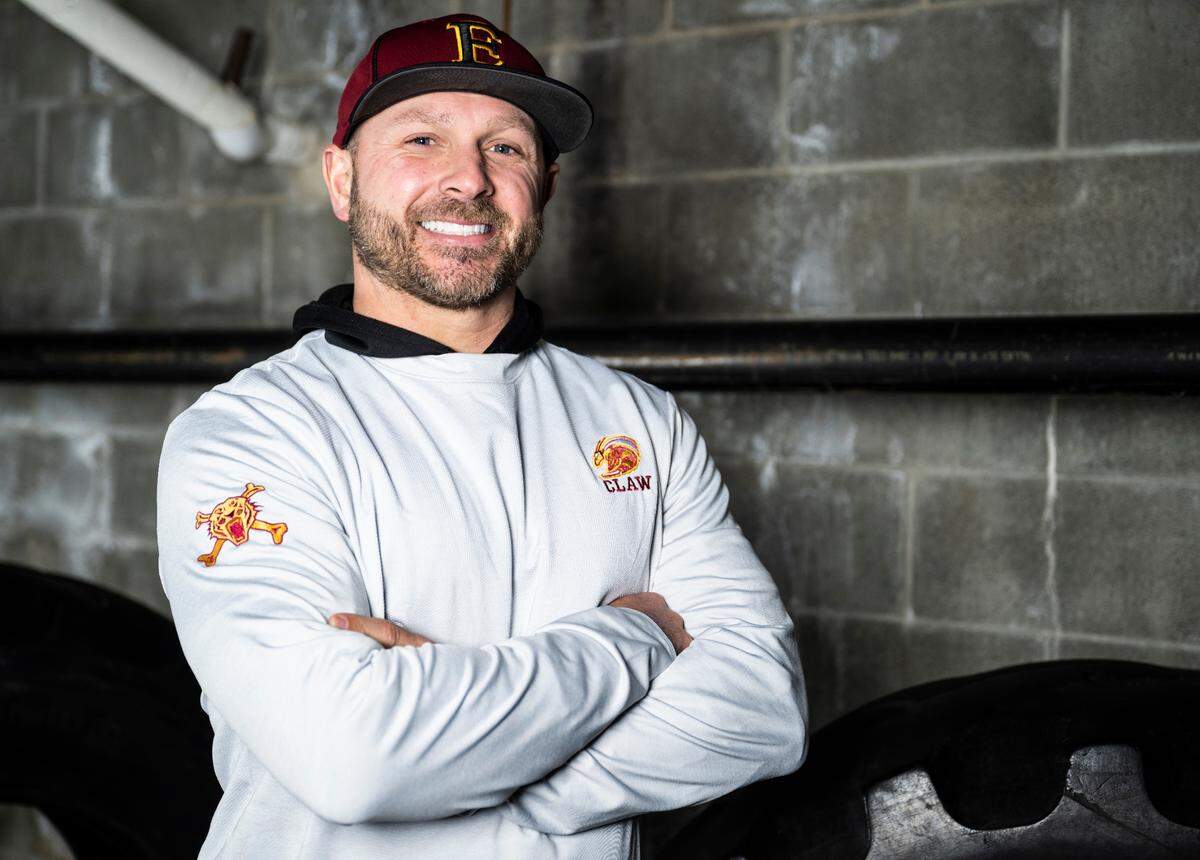Enumclaw football head coach Mark Gunderson poses for a portrait after being selected as a defensive coach for The News Tribune’s 2022 All-Area football team, at Mount Tahoma High School in Tacoma, Wash. on Dec. 4, 2022.