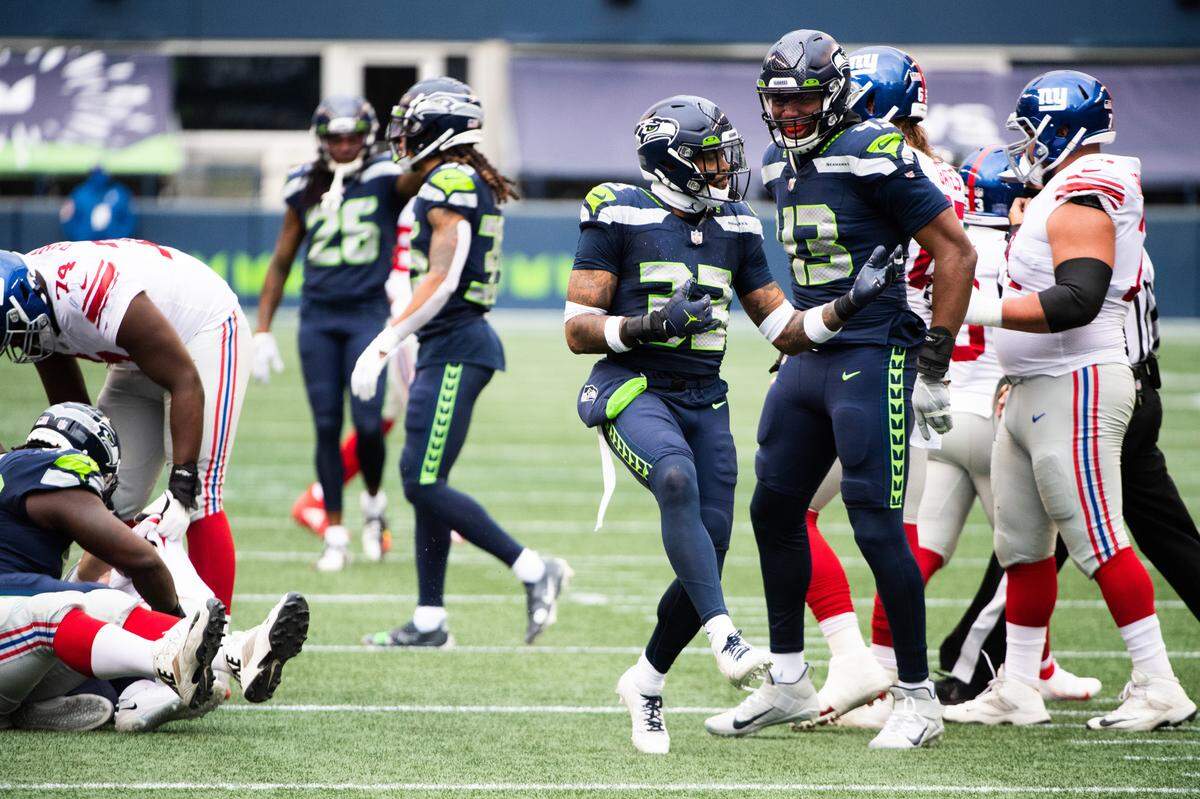 Seattle Seahawks defensive back Jamal Adams celebrates after sacking New York Giants quarterback Colt McCoy during the second quarter. The Seattle Seahawks played the New York Giants in a NFL football game at Lumen Field in Seattle, Wash., on Sunday, Dec. 6, 2020.