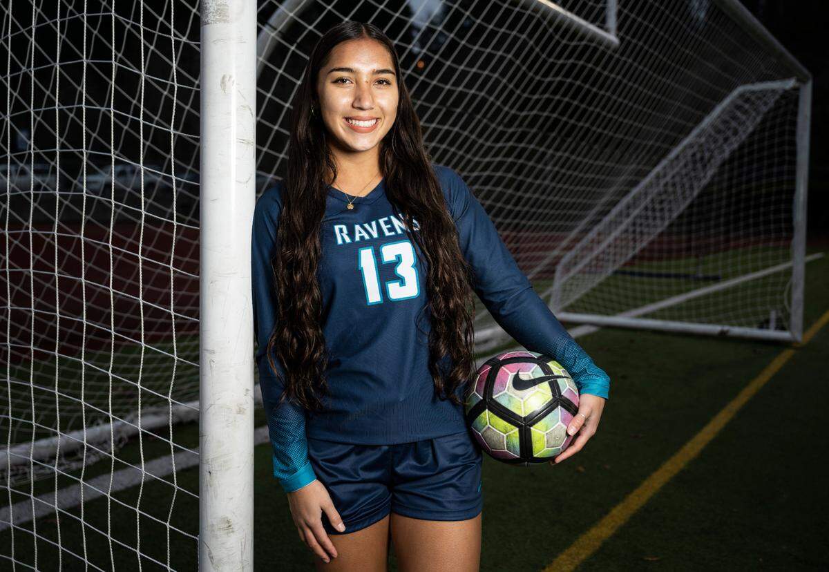 Auburn Riverside senior Samiah Shell poses for a portrait after being selected as the News Tribune’s player of the year, on the soccer field at Auburn Riverside High School in Auburn, Wash. on Dec. 13, 2022.