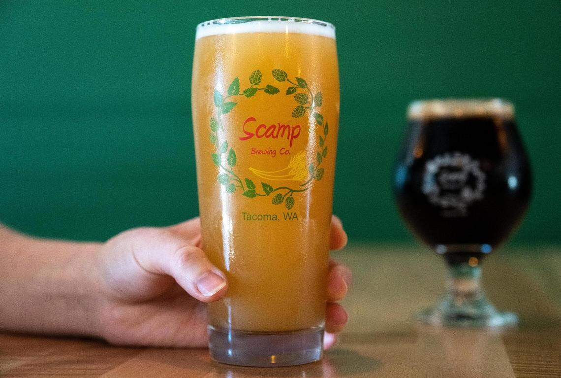 The opening taplist at Scamp Brewing’s new South Tacoma taproom includes a Citra Hefeweizen and, in the goblet, Exile in Sibeeria, a Russian imperial stout with chocolate, coconut and coffee.