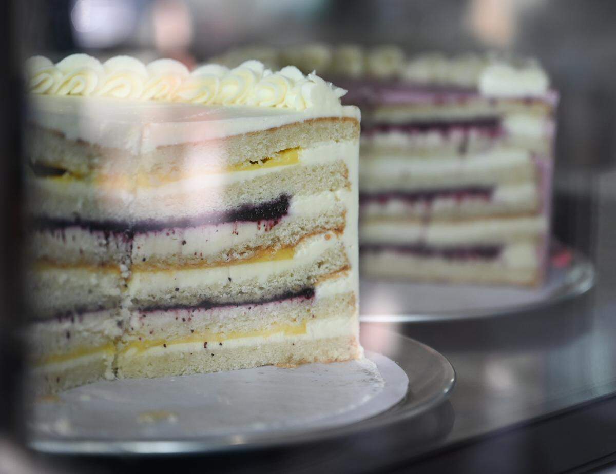 The lemon blueberry cake is a May feature with vanilla cake, fresh blueberry jam, lemon curd, and a cream cheese buttercream.