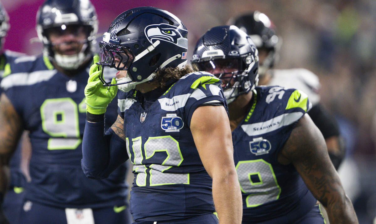 Seattle Seahawks linebacker Drake Thomas (42) reacts to a tackle for a loss Houston Texans running back Nick Chubb (21) during the first quarter of the game at Lumen Field, on Monday, Oct. 20, 2025, in Seattle.