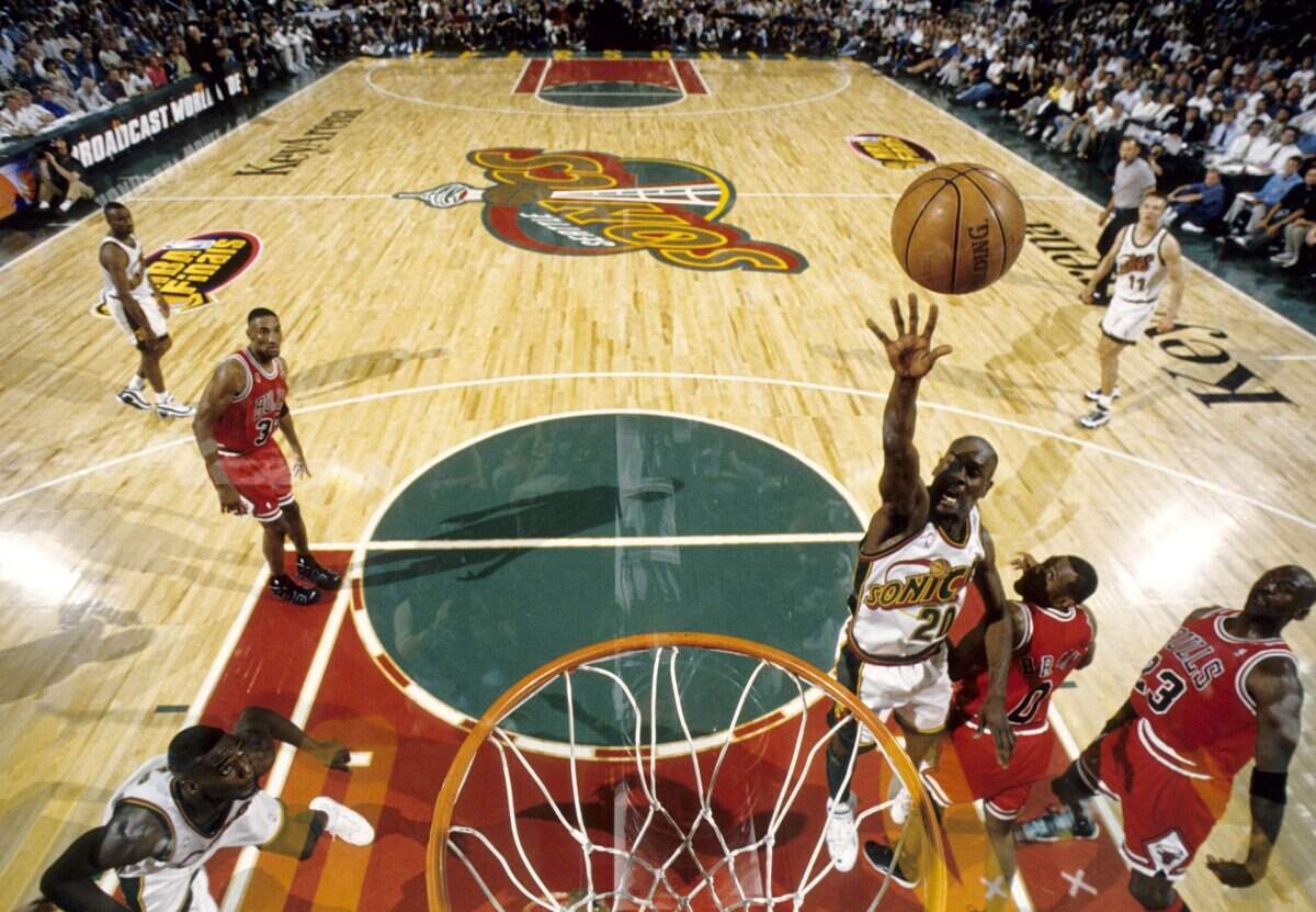 Jun 1996; Seattle, WA USA; FILE PHOTO; Seattle Supersonics guard Gary Payton (20) lays the ball up against the Chicago Bulls during the 1996 NBA Finals at Key Arena. Mandatory Credit: MPS-USA TODAY Sports