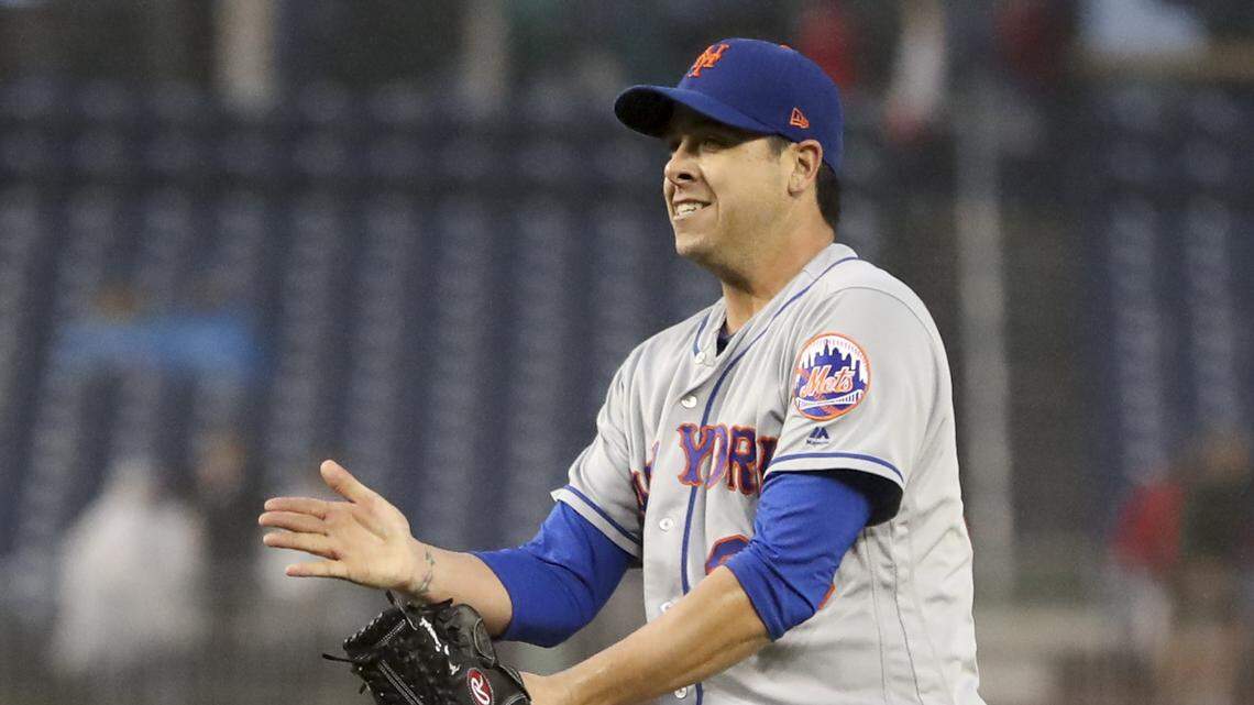 New York Mets relief pitcher Anthony Swarzak celebrates after defeating the Washington Nationals 8-6 at Nationals Park, Sunday, Sept. 23, 2018, in Washington. (AP Photo/Andrew Harnik)