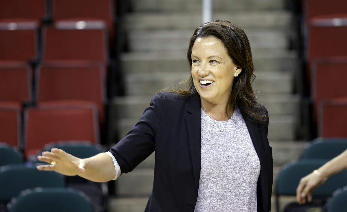 Seattle Storm team president Alisha Valavanis waves before a news conference Thursday, April 21, 2016, in Seattle. The Seattle Storm unveiled No. 1 pick Breanna Stewart, alongside former No. 1 pick and soon-to-be teammate Sue Bird.