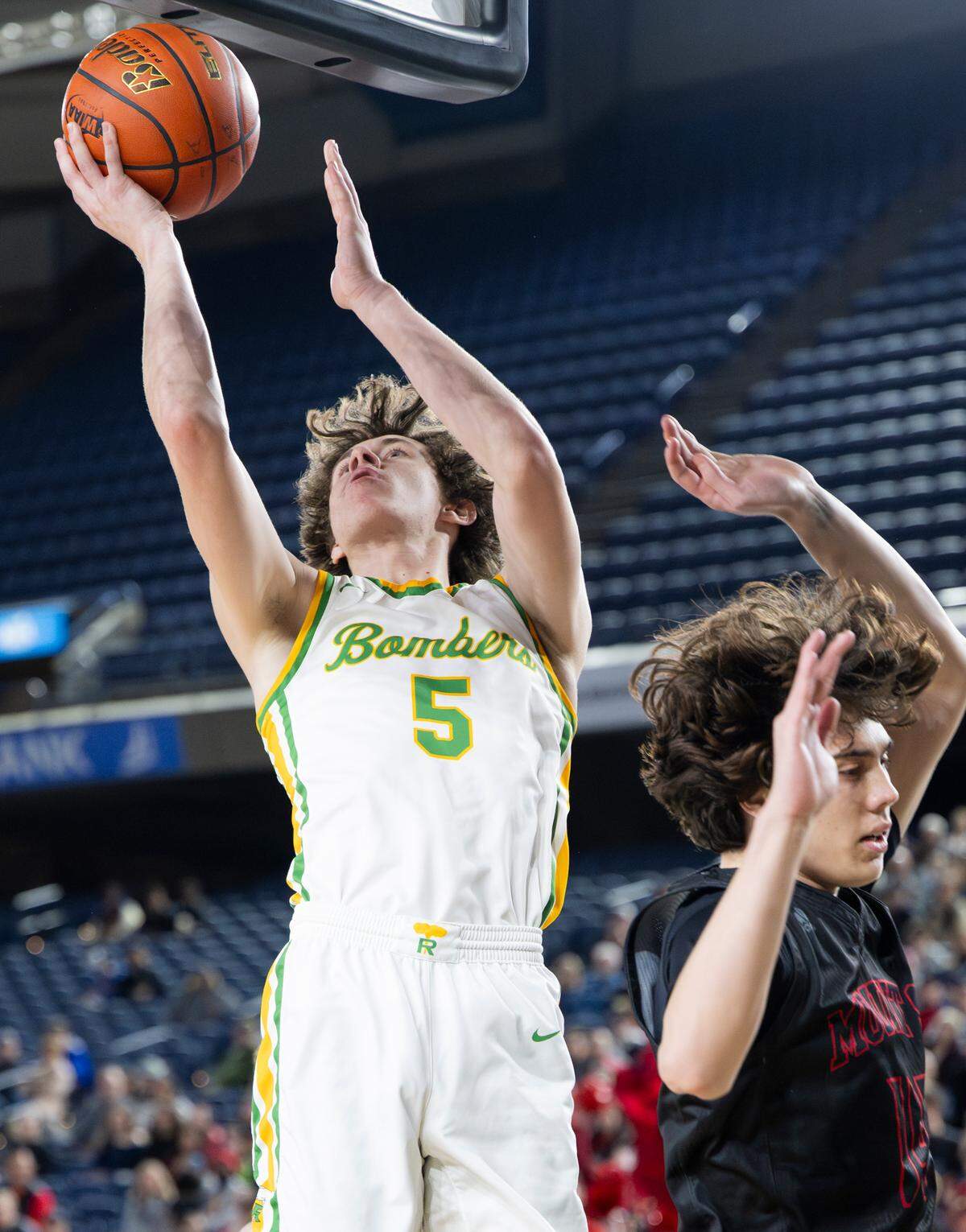 Richland’s Jack Forbes (5) shoots the ball during the first half of the Class 4A state championship game against Mount Si at the Tacoma Dome, on Saturday, March 2, 2024, in Tacoma, Wash.