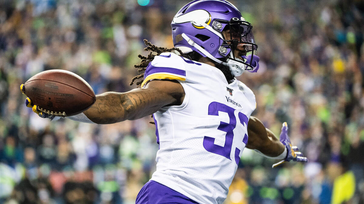 Minnesota Vikings running back Dalvin Cook (33) celebrates a touchdown run during the first quarter. The Seattle Seahawks played the Minnesota Vikings in a NFL football game at CenturyLink Field in Seattle, Wash., on Monday, Dec. 2, 2019.