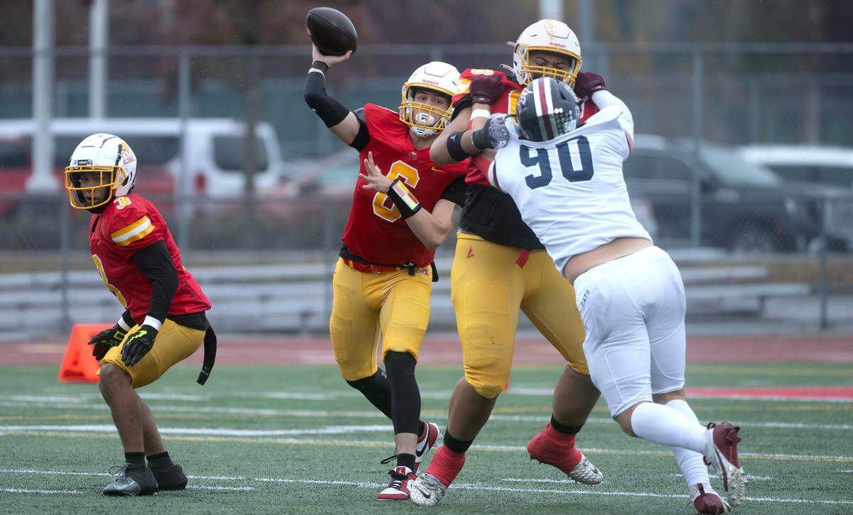 Mount Tahoma quarterback Mikkah Cordero delivers a pass during Saturday afternoon’s 3A state playoff football game against the Mount Spokane Wildcats at Mount Tahoma High School in Tacoma, Washington, on Nov. 9, 2024. Mount Tahoma won the game, 35-13.