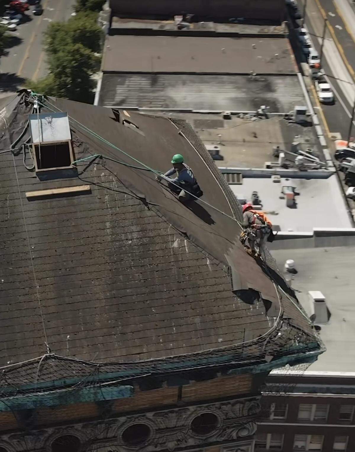 Workers recently tackled roof repairs at Tacoma’s Old City Hall, 625 Commerce St.