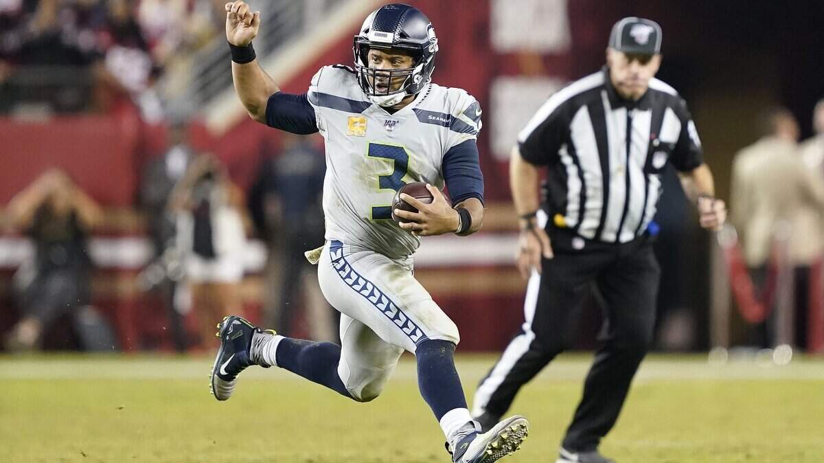 Seattle Seahawks quarterback Russell Wilson (3) runs the ball against the San Francisco 49ers during the second half of an NFL football game in Santa Clara, Calif., Monday, Nov. 11, 2019. (AP Photo/Tony Avelar)