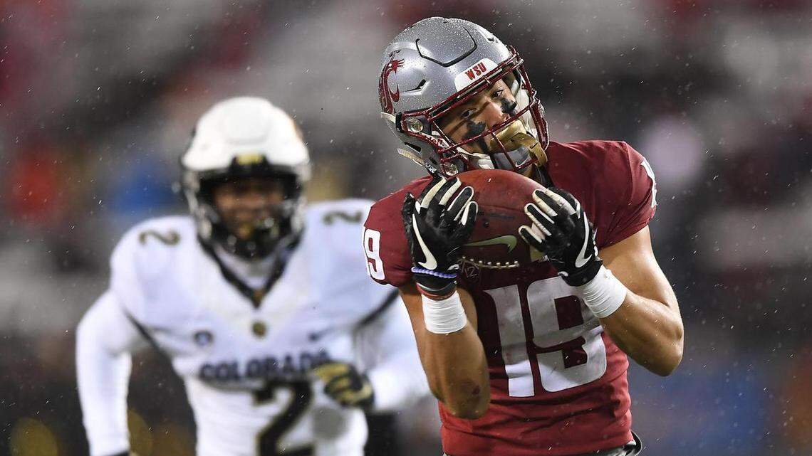 Rain, defense help WSU trample Colorado, snap 3-game football losing streak