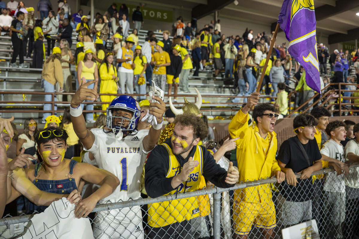 Puyallup students celebrate their win over Emerald Ridge on Friday, Sept. 26, 2025, in Puyallup, Wash.