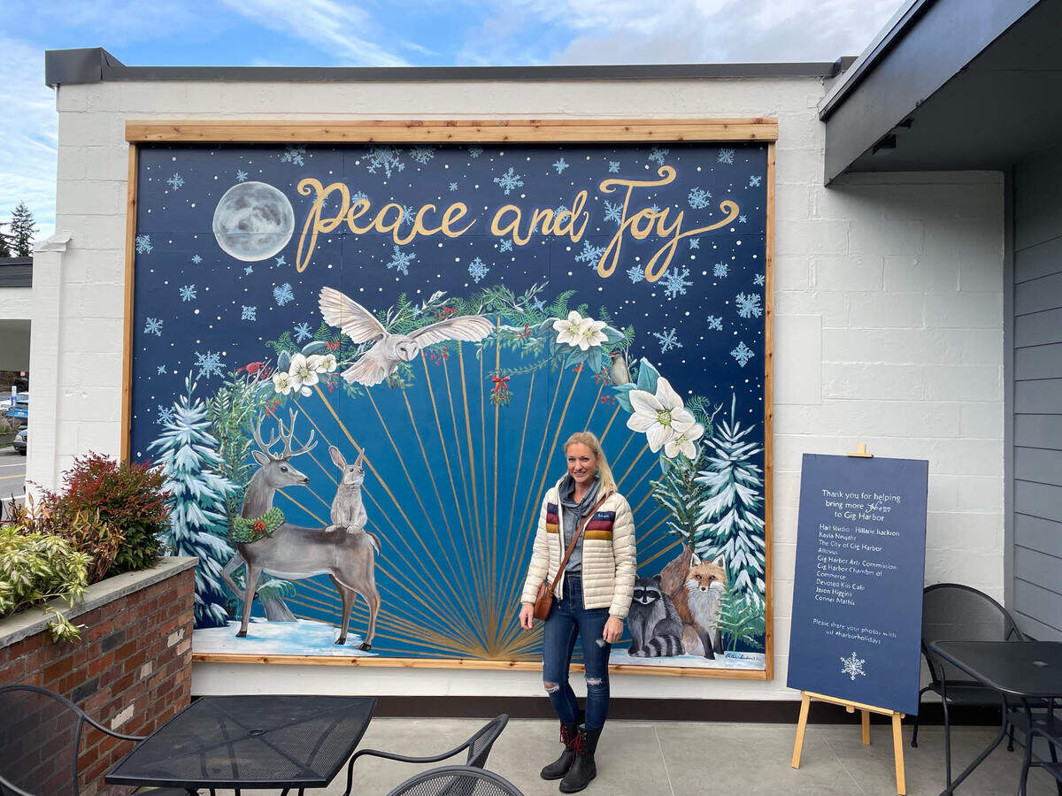 The city of Gig Harbor contracted with artist Hillarie Isackson for a seasonal glow-in-the-dark mural illuminated with UV lights at night.