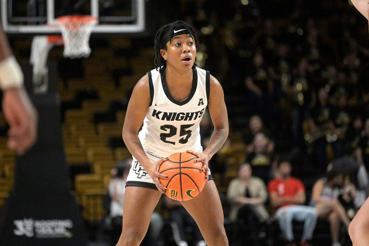 Central Florida guard Ahna Burney (25) sets up a play during the second half an NCAA college basketball game against Tennessee on Friday, Nov. 12, 2021, in Orlando, Fla. (AP Photo/Phelan M. Ebenhack)