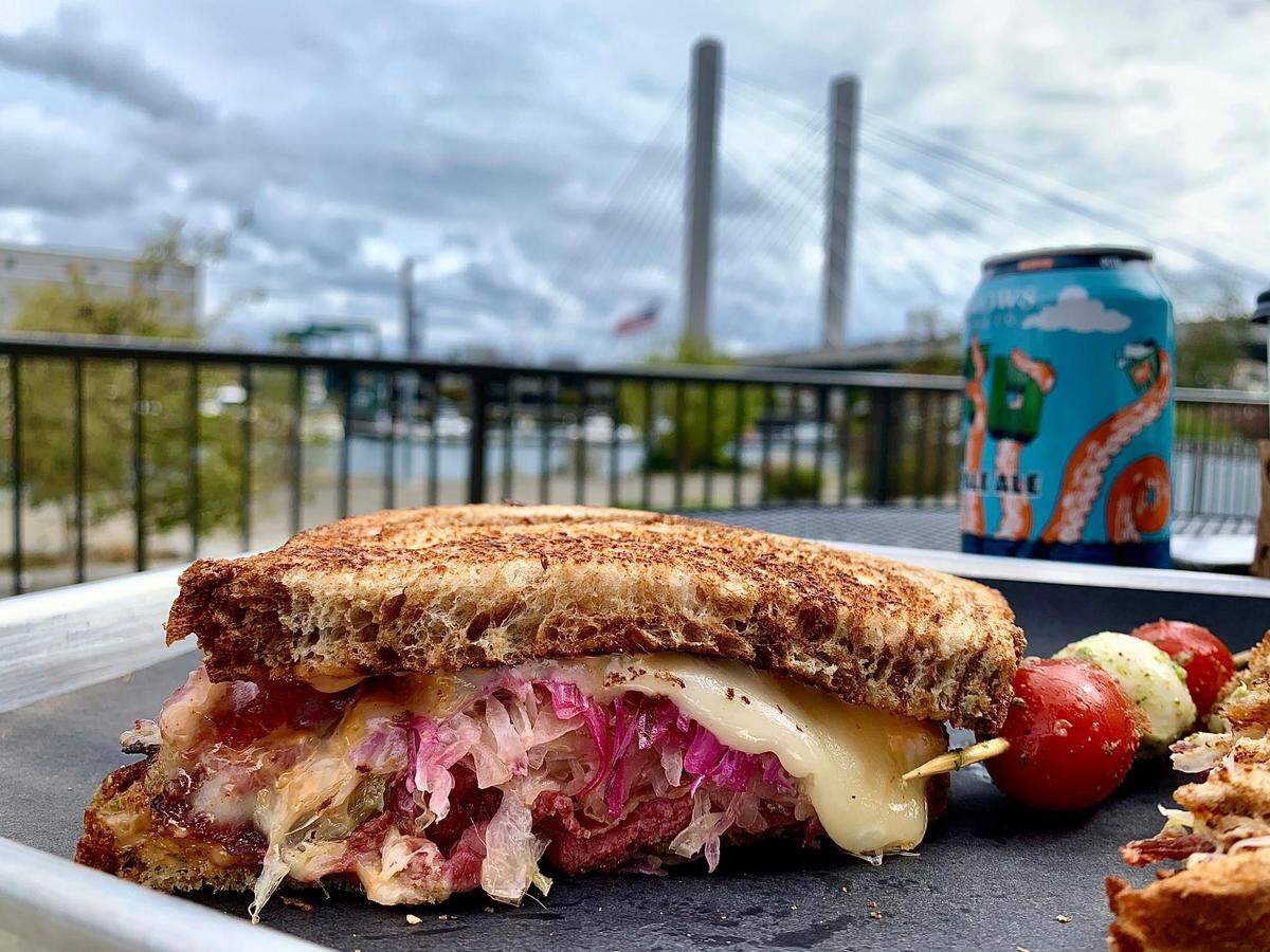 Dock Street Deli operates inside West of the Waterway, on the waterfront side of The Henry apartments in Tacoma, Wash. The menu features deli favorites, like the Reuben with red cabbage slaw.