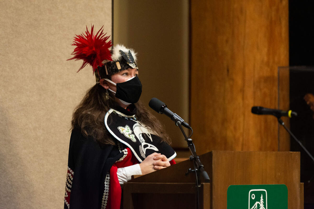 Davina Barril, who is also Tlingit and a member of the Alaska Kuteeyaa Dancers, shares stories about her grandmother Amy Hallingstad at the Elizabeth Peratrovich Day celebration Wednesday, Feb. 16, at the Evergreen Longhouse at Evergreen State College in Olympia, Wash. Hallingstad advocated for desegregating schools, noting that Alaska Natives were forced to pay taxes to support the whites-only public school their children could not attend.