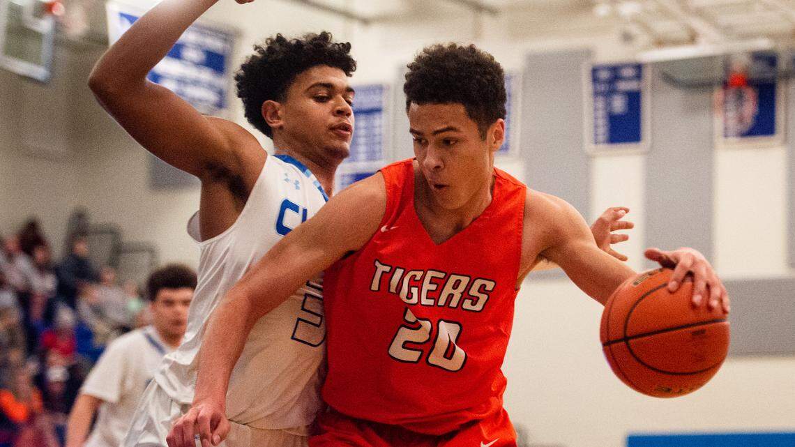 Battle Ground’s Kaden Perry (2) works against Curtis’ Jared Franklin (3). Curtis played Battle Ground in a basketball game at Curtis High School in Tacoma, Wash., on Thursday, Feb. 7, 2019.
