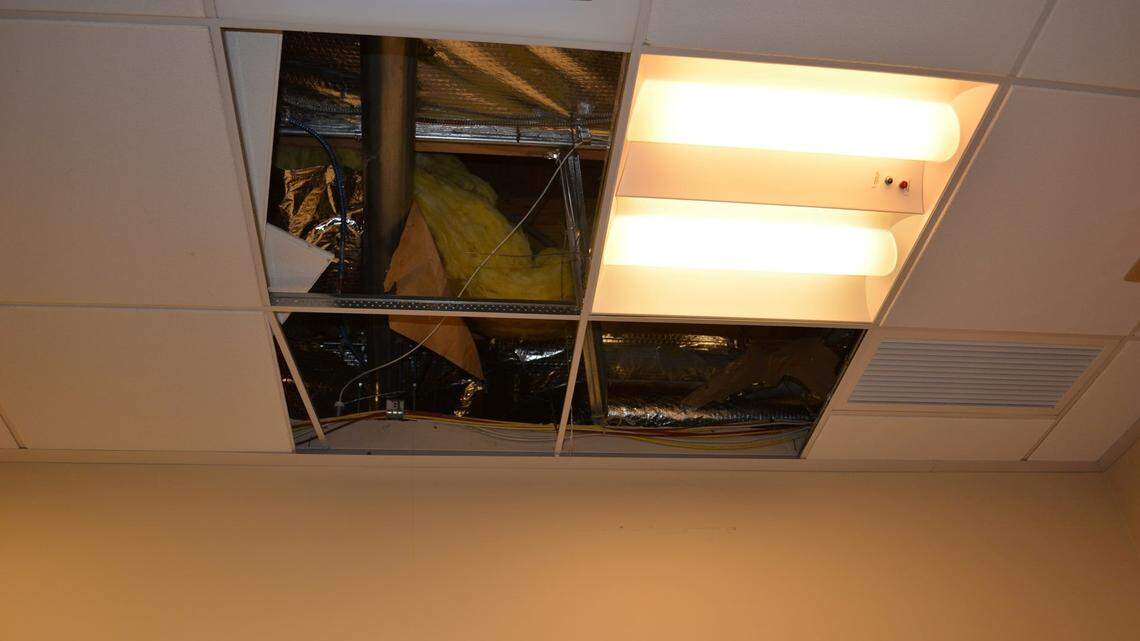 A burglary suspect broke into a Newcastle, Washington, bank on Jan. 3, 2022, after hiding in the ceiling for over 12 hours, police said. The suspect entered the bank through a hole in the ceiling.