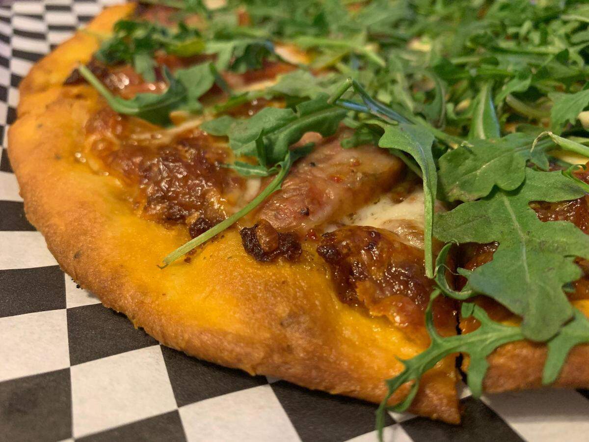 The Tipsy Tomato on Center Street in Tacoma serves surprisingly good thin-crust pizza, with an array of crazy toppings from which to choose.