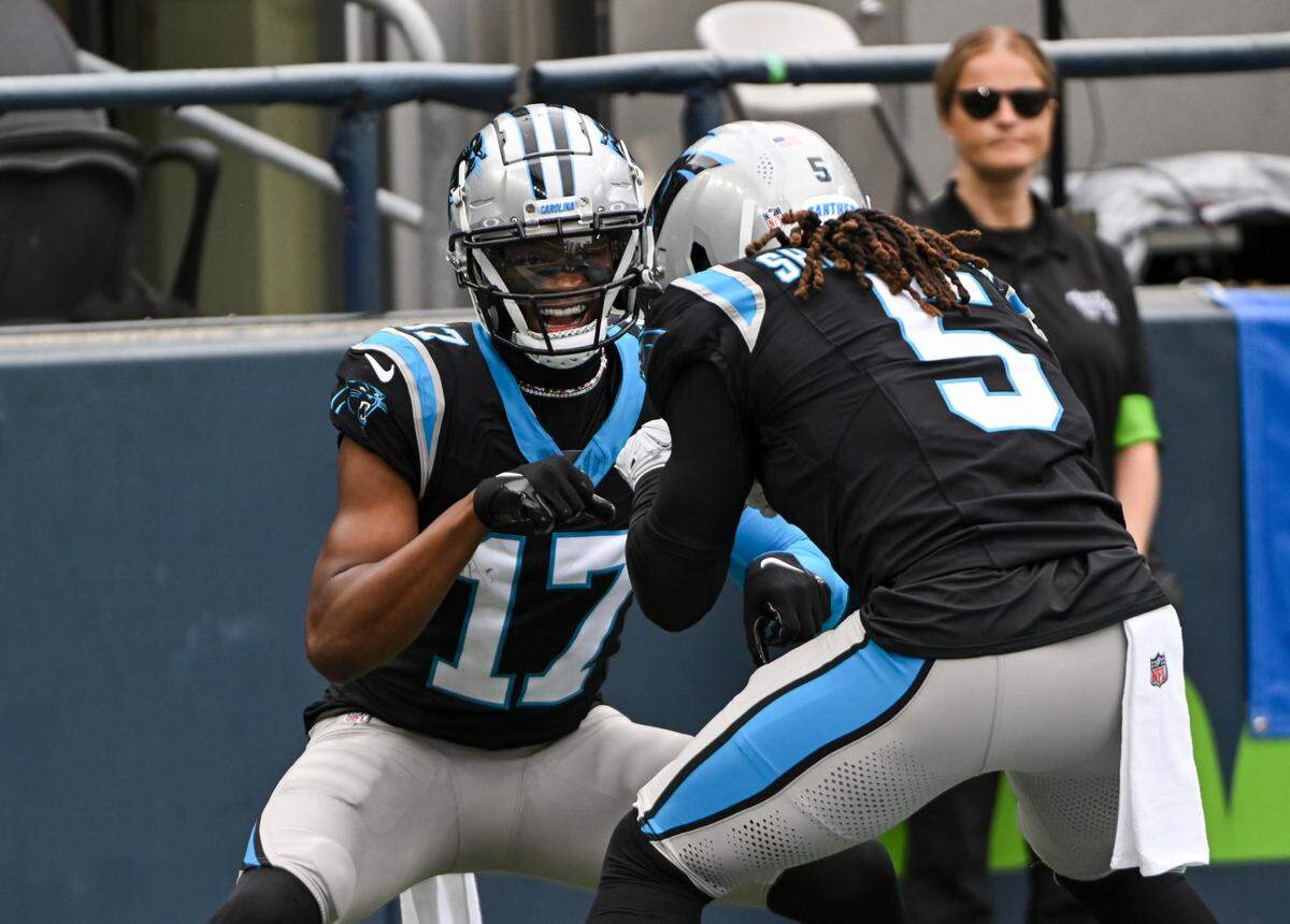 Carolina Panthers wide receiver DJ Chark Jr. (17) and wide receiver Laviska Shenault Jr. (5) celebrate DJ Chark Jr.’s touchdown during the second quarter of the game against the Seattle Seahawks at Lumen Field, Sunday, Sept. 24, 2023, Seattle, Wash.