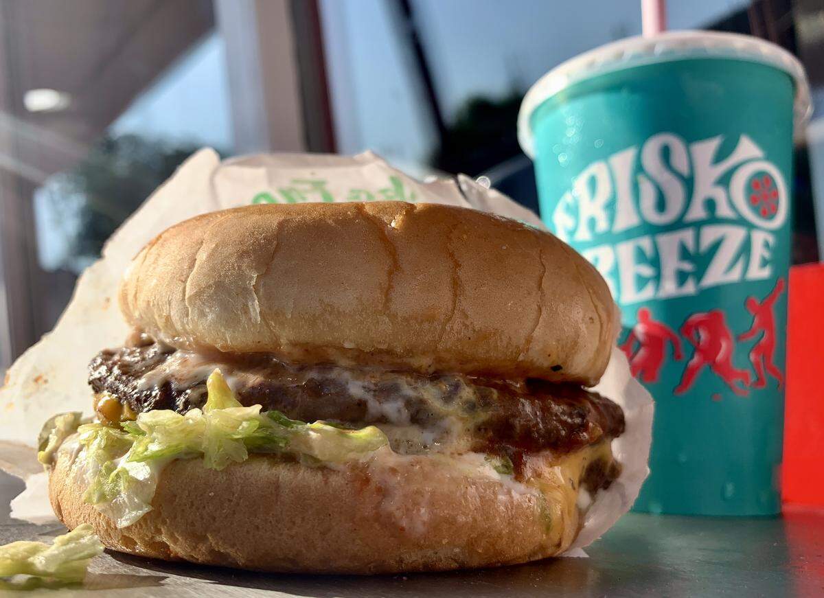 Frisko Freeze has served Tacoma since 1950. A hefty interior renovation in 2024 hasn’t changed the juicy, nicely portioned burgers with their unique white sauce and red relish.