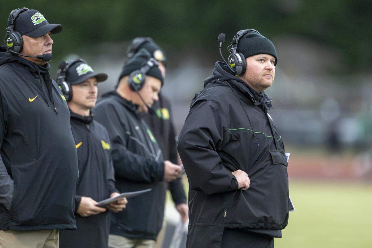 Tumwater head coach William “Willie” Garrow, right, watches the T-Birds play Franklin Pierce from the sidelines on Saturday, Nov. 22, 2025, in Tumwater, Wash.