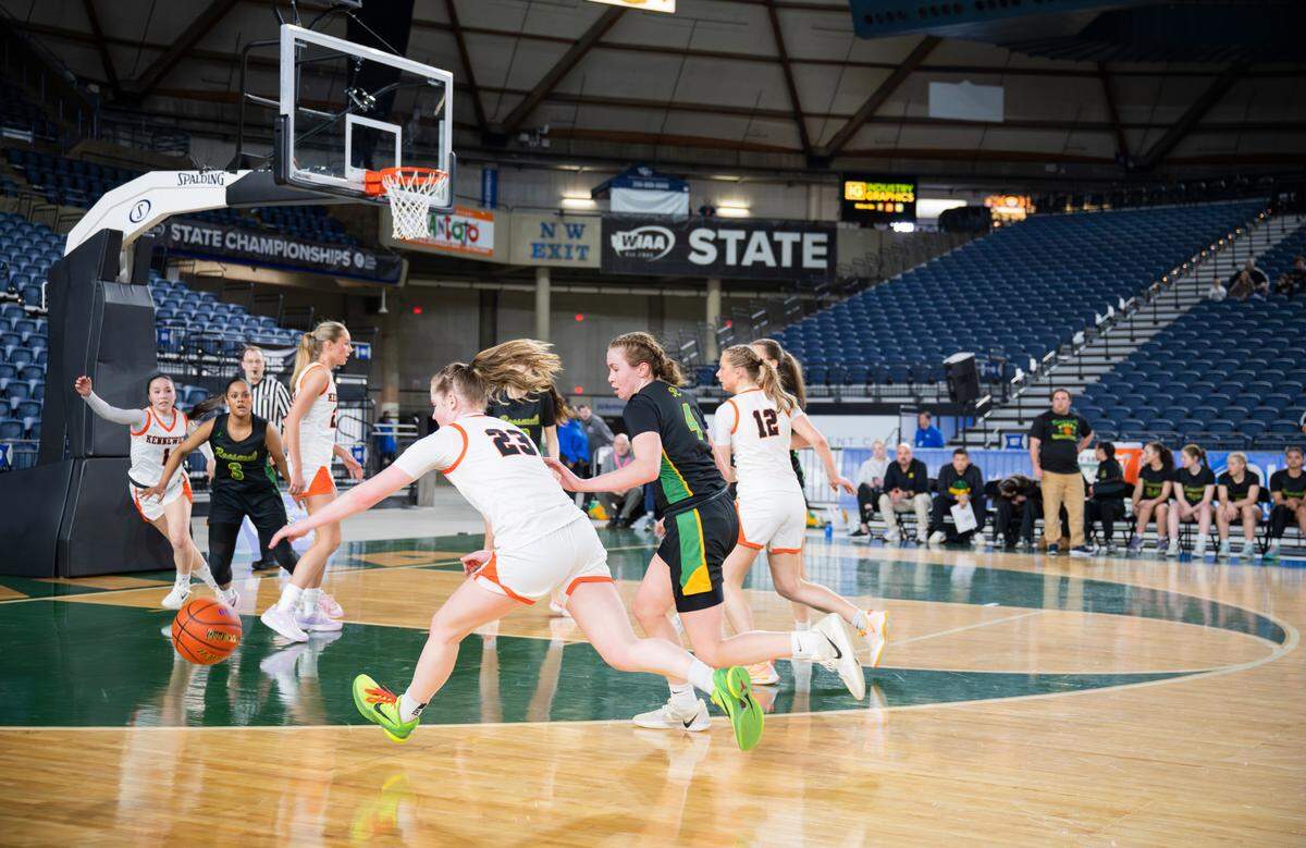 Kennewick and Roosevelt girls compete during the first half of a Class 4A state basketball tournament first-round game at the Tacoma Dome on Wednesday, March 5, 2025, in Tacoma, Wash.
