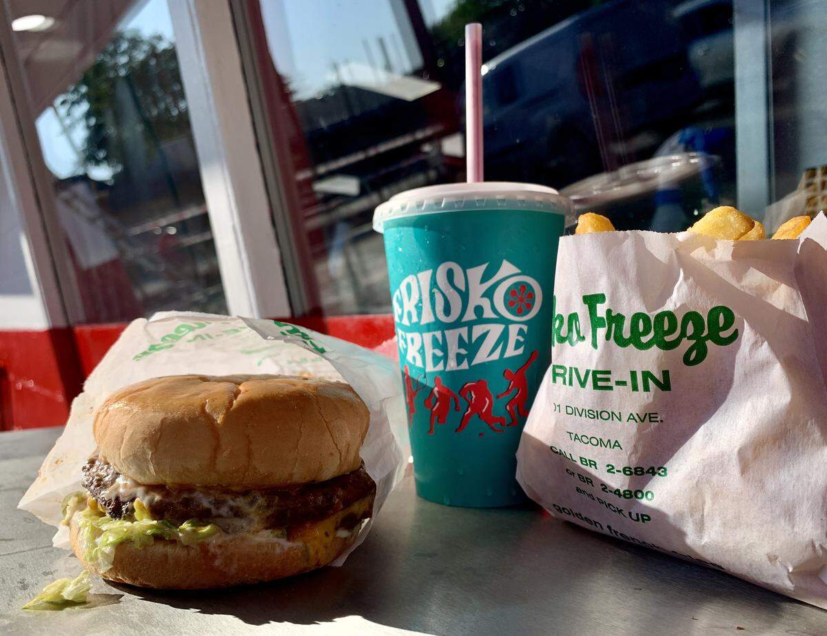 Locals consider Frisko Freeze the best burger in Tacoma and Pierce County, after 75 years. Pictured here is a double beefburger with golden fries and a shake.