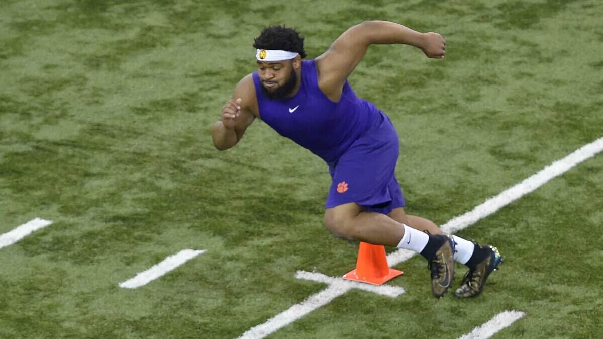 Clemson’s Christian Wilkins runs drills during NFL Pro Day, Thursday, March 14, 2019, in Clemson, S.C. (AP Photo/Richard Shiro)
