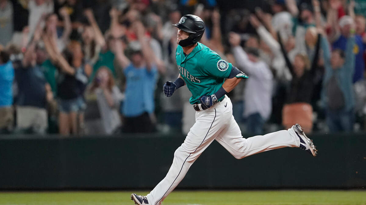 Seattle Mariners’ Mitch Haniger rounds the bases after he hit a grand slam during the eighth inning of the team’s baseball game against the Los Angeles Angels, Friday, July 9, 2021, in Seattle. The Mariners won 7-3. (AP Photo/Ted S. Warren)