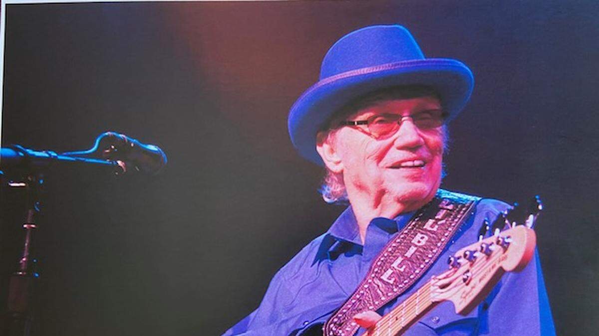 “Little Bill” Engelhart plays his guitar on stage.